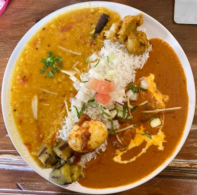 Ganesh N: täglich wechselnde Curry-Teller